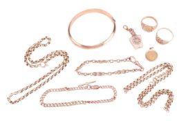 A collection of jewellery items including a 9ct gold curb link bracelet with attached T-bar, a 9ct g