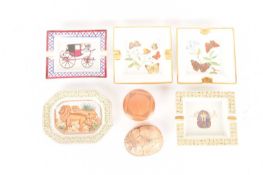 A collection of ashtrays comprising a Hermès Paris porcelain ashtray, a pair of Dubarry porcelain de