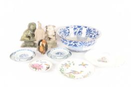 A large Chinese blue and white wash basin, 20th-century, alongside a pair of blue and white raised d