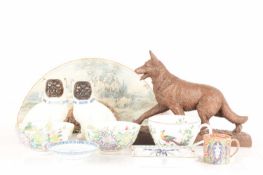 A collection comprising a pair of Staffordshire-style pugs, a pair of Chinese floral bowls, a small 