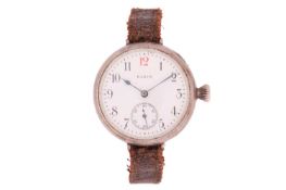 A 1914 Elgin keyless wound trench watch, featuring a white face with Arabic numerals in a silver cas