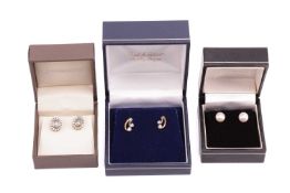 Three pairs of earrings including a pair of 18ct bi-colour gold spiral stud earrings, each set with 