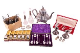 A 9 carat gold thimble, 5.3 grams; together with a cased set of six silver teaspoons and tongs. Shef