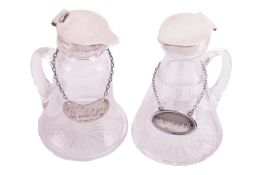 An Asprey & Co. silver topped whiskey noggin, circa 1912, and a Mappin & Webb silver topped 