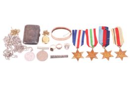 A collection of items including a yellow metal bangle tested as 14ct gold, a 9ct gold smoky quartz r