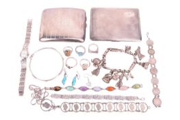 A collection of silver cigarette cases and jewellery; including a silver cigarette case with engrave