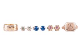 A collection of jewellery comprising three pairs of earrings and two rings; including a pair of ruby
