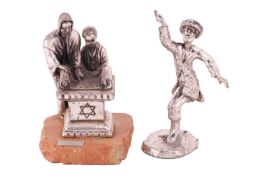 Two figurines of Judaica interest - Model of a Bar Mitzvah boy reading from the Torah with Rabbi at 