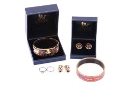 A diamond-set solitaire ring and matching wedding band; the illusion-set round brilliant diamond mea