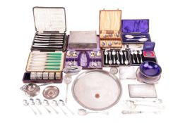 A collection of silver and silver plate; including a silver cigarette case, a cased pair of silver p