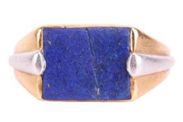 A lapis lazuli signet ring, featuring a rectangular lapis lazuli panel, the shoulders in bi-colour m