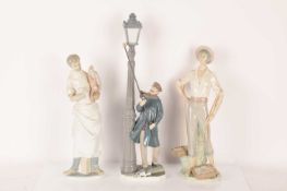 Lladro: A collection of figurines comprising a Lladro Professionals Fisherman (4802), The Lamplighte