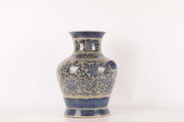 A Chinese-style baluster vase, 20th-century, fitted with applied Dogs of Foo handles and decorated w