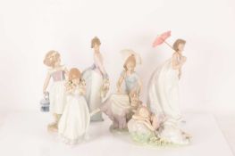 Lladro: A collection of figurines comprising Spring Bouquets (7603), Good Morning Butterfly (8520), 
