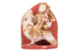 An Indian carved marble figure of the Hindu goddess Saraswati, 20th-century, painted and partially g