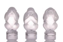 A contemporary Lalique frosted glass set of three paperweights, modelled as the three wise monkeys, 