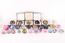 Caithness: A large collection of paperweights including Crown Jewel (28/50), 40th Anniversary of Que