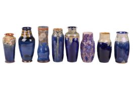 A Royal Doulton stoneware vase of Art Nouveau design, by Ada Tosen, 23.5 cm high, together with seve