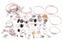A small mixed collection of white metal jewellery items, to include a Tiffany & co. double leaf 