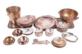 A collection of silver plate to include four salvers, a cake stand, two placemats, an ice bucket, th