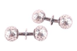 Hermès - a pair of ball cufflinks, engraved with 'HERMES' motifs all over, signed and marked '925', 