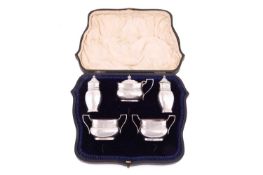 A cased silver five-piece cruet set, by Edward Barnard & Sons Ltd., London 1908, comprising a mu