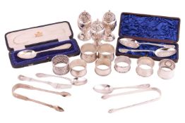 A collection of silver and silver plate items comprising three Victorian pepperettes, hallmarked She