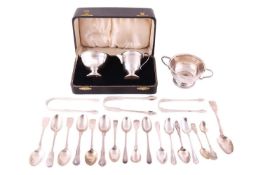 A boxed milk jug and sugar basin set by Barker Brothers Silver Ltd., Birmingham 1939; together with 