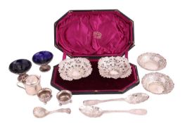 A cased pair of pierced bon bon dishes by George Nathan & Ridley Hayes, decorated with intricate