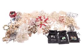 A large quantity of costume jewellery; comprising mostly imitation pearl set necklaces, bracelets, a