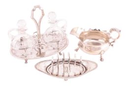 An Italian oil and vinegar cruet set, oval-shaped stand fitted with two glass jugs, with shaped hand