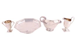 A small collection of silver items to include an Art Deco sauceboat by William Neale, Birmingham 191