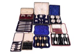 A Walker and Hall cased set of two pickle forks, a cased set of toothpicks with rooster finials, a c