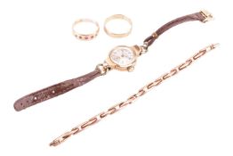 A collection comprising a lady's dress watch hallmarked 9ct. by J.W Beson lady’s dress watch and an 