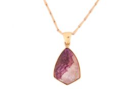 A Blue John doublet pendant on chain, comprising a shield-cut Blue John backed with a mother-of-pear