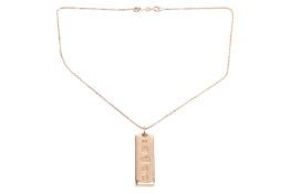 An Ingot Pendant, hallmarked 9ct gold on a 9ct yellow gold box chain. Total weight of items: 34.93g.