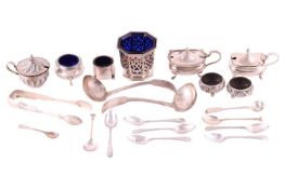 A quantity of silver items; including a pair of sauce ladles, a pair of sugar tongs, a set of loose 