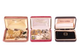 A collection of jewellery items including a pair of lozenge-shaped cufflinks with the Chinese charac