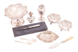 A George III silver master butter knife with a mother-of-pearl handle, a pair of pierced and lobed b