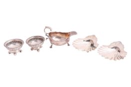 A pair of George III silver shell-shaped butter dishes by William Plummer, London 1778, decorated wi