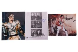 Three signed items of entertainment memorabilia, comprising a colour photograph of Freddie Mercury, 