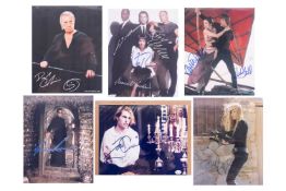 A collection of signed celebrity photographs, comprising: Mark Hamill & Carrie Fisher (Star Wars