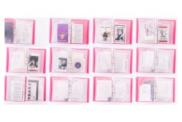 A folder containing assorted signed celebrity ephemera, to include an autographed letter from David 
