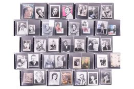 A folder containing assorted signed celebrity photographs, to include Lana Turner, Donald Sinden, Ru