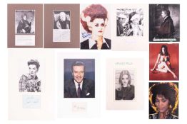 A collection of signed celebrity items, comprising: Whitney Houston, Patricia Quinn, Maggie Smith, W