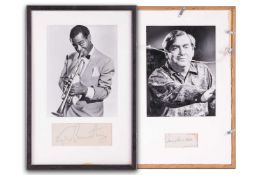 Louis Armstrong: a framed and glazed black and white photograph with inset signature card, the rever