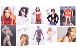 A collection of signed celebrity photographs, comprising: Britney Spears, Christina Ricci, Angelina 