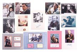 A collection of signed celebrity photographs, comprising: Elton John, Robert Powell, Joss Ackland, S