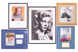 A large black and white signed photograph of Lauren Bacall, 46 cm x 32 cm, together with a signed co