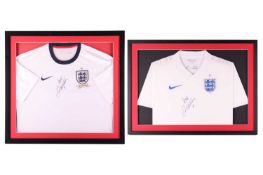 David Beckham: two hand-signed Nike England football shirts, each professionally mounted and framed,